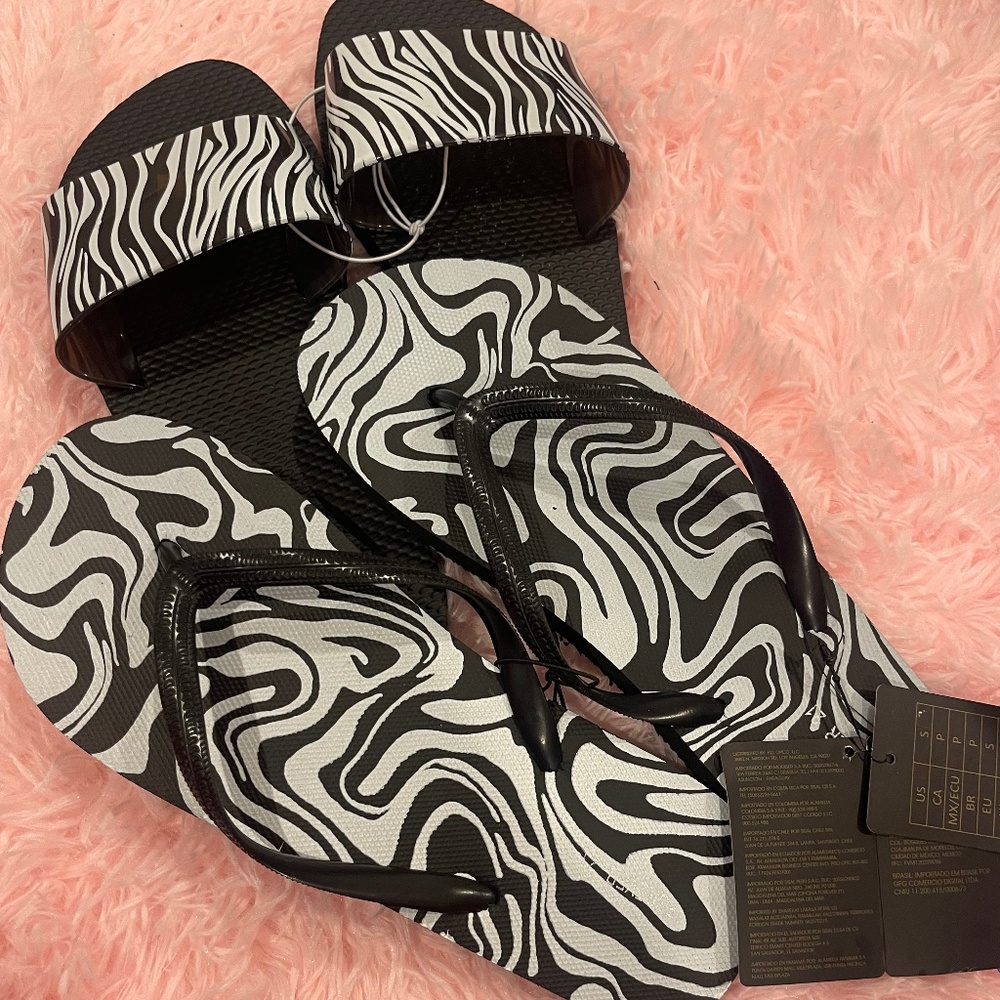 2 pairs of zebra print sandals